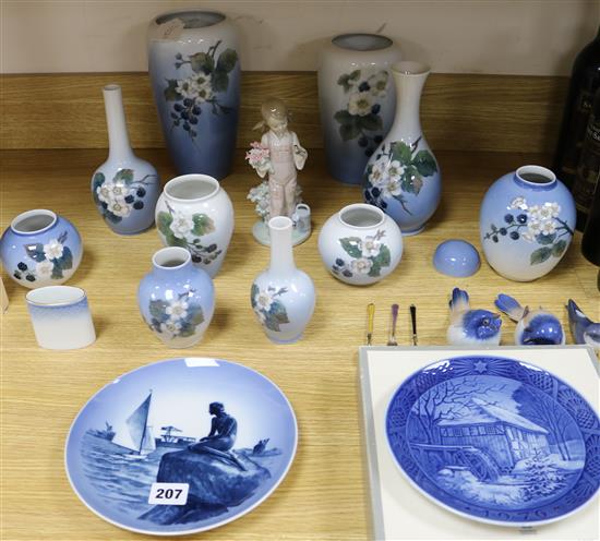 A group of eleven Royal Copenhagen blackberry pattern vases, a Christmas plate and a mermaid plate, etc